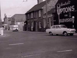 Photo 10  - Uptons sign on corner of Normanby Top.