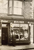 Photo 4  - Normanby High St, Mrs.Sayer outside Bakers and Confectioners