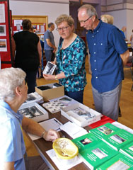 Photo 16  - 2015 Exhibition - Visitors from Heidelberg, Germany Selecting Postcards