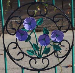 Photo 3  - 2024 Normanby Remembrance Day Service - Poppies on Railings of Remembrance Garden, Cleveland St