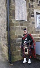 Photo 1  - 2023 Normanby Remembrance Day Service - Phil Meadows beneath the Normanby War Memorial