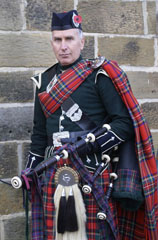 Photo 2  - 2023 Normanby Remembrance Day Service - Phil Meadows Resplendently Dressed as Piper of Black Watch
