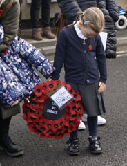 Photo 11  - 2023 Normanby Remembrance Day Service - Phoebe Carrying Wreath from Normanby Primary School 