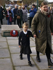 Photo 20  - 2023 Normanby Remembrance Day Service - Phoebe with mother Hannah have just - placed a wreath on behalf of Normanby Primary School