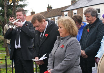 Photo 7  - 2013 Normanby Remembrance Day - Alan Stewart (playing last post), George Dunning & Carole Simms