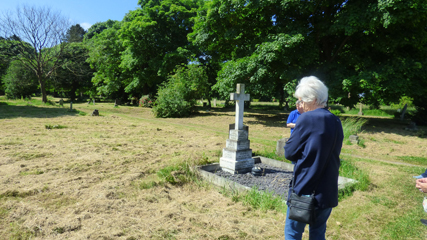 Photo 6  - Linthorpe Cemetery Trip - Ian Stubbs and Barbara Greenmon by - the Grave of Councillor William Eckert and - His Son Mostyn of the RAF Killed in a Flying Accident in Canada in 1943