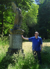 Photo 13  - Linthorpe Cemetery Trip - Ian Stubbs by the - Grave of James Bedford Elliot, Inventor of Unicycle