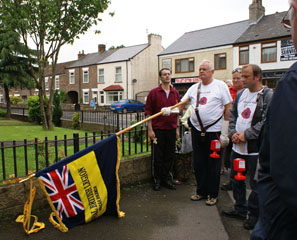 Photo 7  - British Legion Memorial Walk - Standard of Royal British Legion dipped in respect