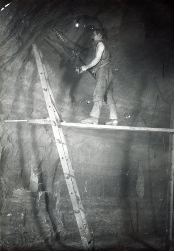 Eston Ironstone Mine Photo 5: Miner Working Precariously at Height on Roof